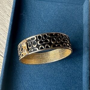 Coach Black and Gold Signature Cuff Bracelet